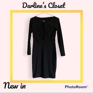 Black bodycon dress. Open slit for beautiful cleavage. Size small.
